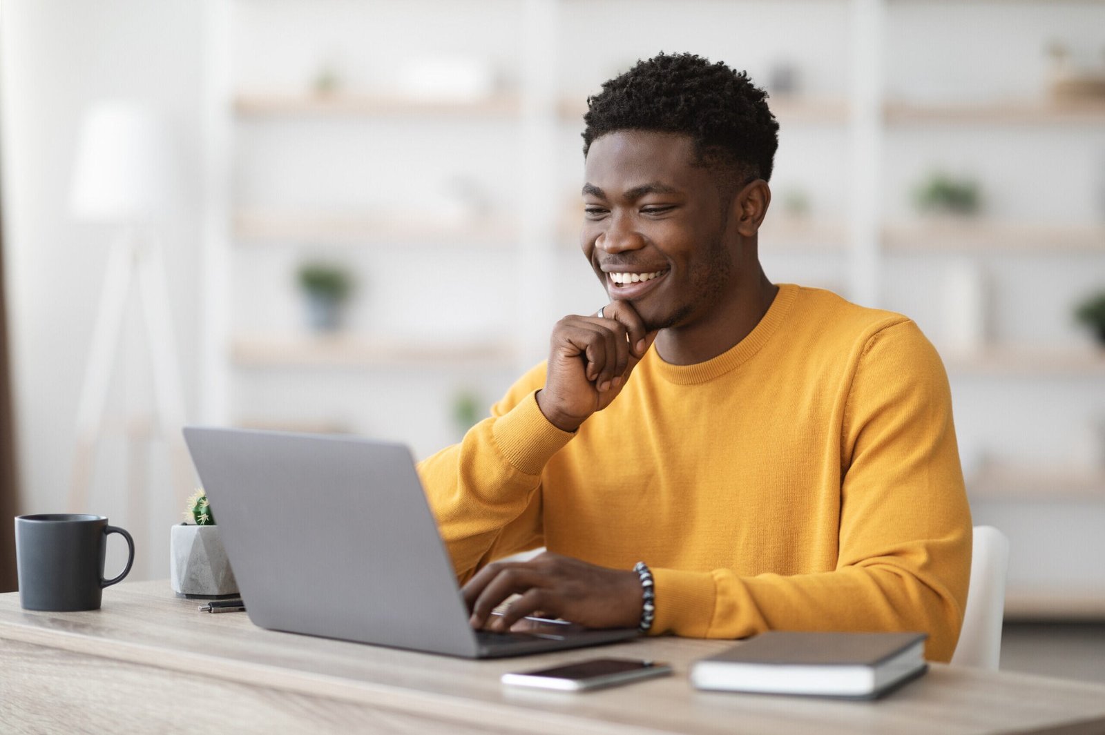 Adult student studying online at home